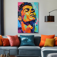 Moderan slika na platnu s motivom Cristiano Ronaldo - Energia víťaza u narandžasto-ljubičastih nijansama, energična atmosfera, slava | Slika Cristiano Ronaldo - Energia víťaza – proizvod